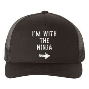 IM With The Ninja Costume Halloween Matching Couple Yupoong Adult 5-Panel Trucker Hat