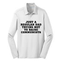 Just A Regular Dad Trying Not To Raise Communists Silk Touch Performance Long Sleeve Polo