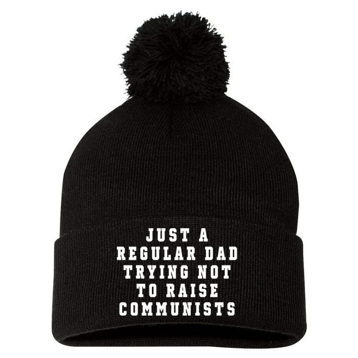 Just A Regular Dad Trying Not To Raise Communists Pom Pom 12in Knit Beanie