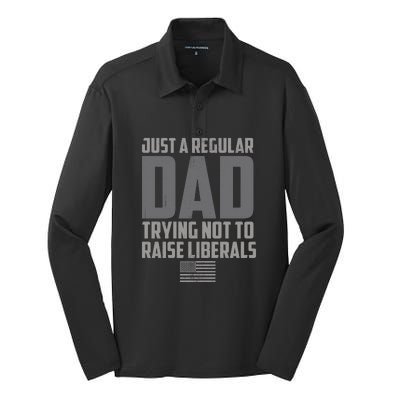 Just A Regular Dad Trying Not To Raise Liberals Silk Touch Performance Long Sleeve Polo