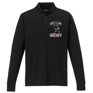 Just a  who loves Hockey Ice Performance Long Sleeve Polo