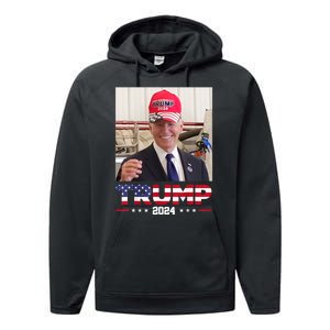 Joe Biden Wearing A Trump Hat Performance Fleece Hoodie