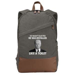 Joe Biden Wasn't Elected He Was Installed Like A Toilet Cotton Canvas Backpack