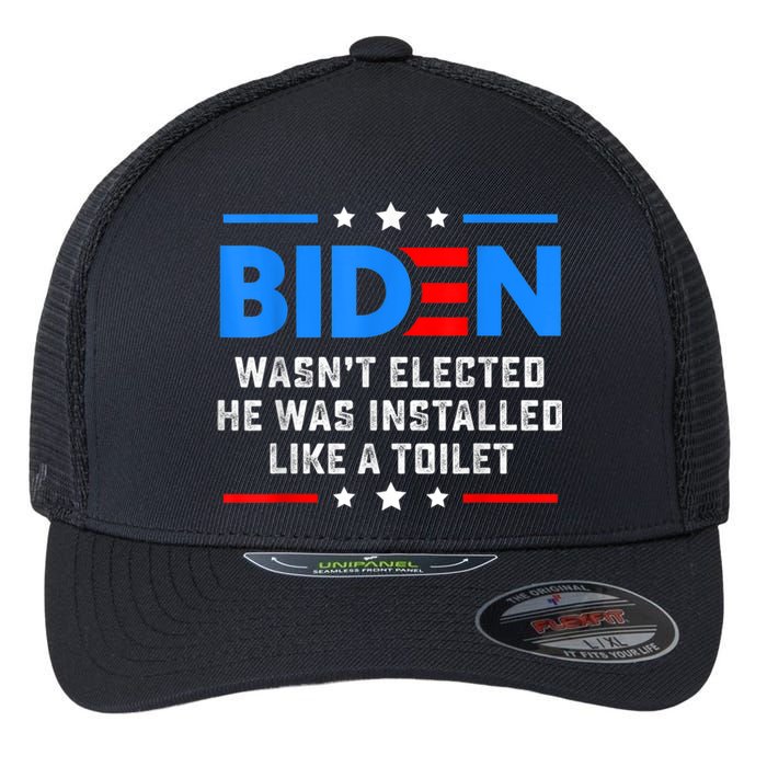 Joe Biden Wasn’t Elected He Was Installed Like A Toilet Flexfit Unipanel Trucker Cap