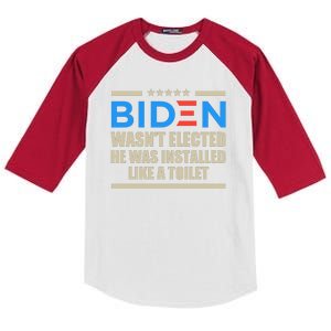 Joe Biden Wasn’t Elected He Was Installed Like A Toilet Kids Colorblock Raglan Jersey