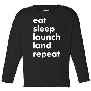 Jen Crowley Wearing Eat Sleep Launch Land Repeat Toddler Long Sleeve Shirt