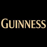 Joe Montana Wearing Guinness Bag