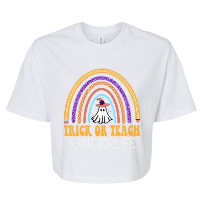 Janitor Rainbow Trick Or Teach Funny Ghost Halloween Gift Bella+Canvas Jersey Crop Tee