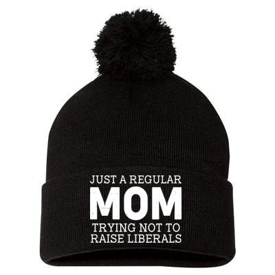 Just A Regular Mom Trying Not To Raise Liberals Pom Pom 12in Knit Beanie