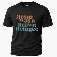 Jesus Was A Brown Refugee No Is Illegal On Stolen Land Cooling Performance Crew T-Shirt