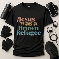 Jesus Was A Brown Refugee No Is Illegal On Stolen Land Cooling Performance Crew T-Shirt