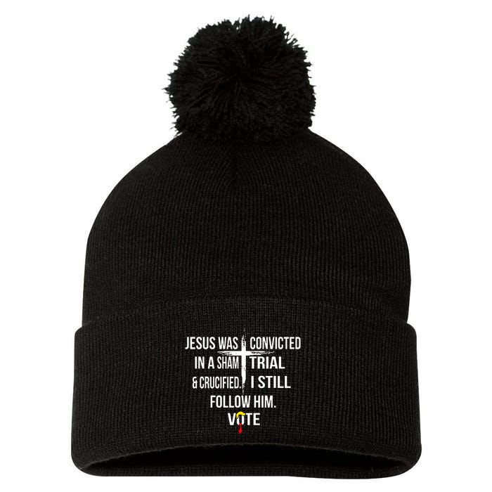Jesus Was Convicted In A Sham Trial And Crucified Pom Pom 12in Knit Beanie