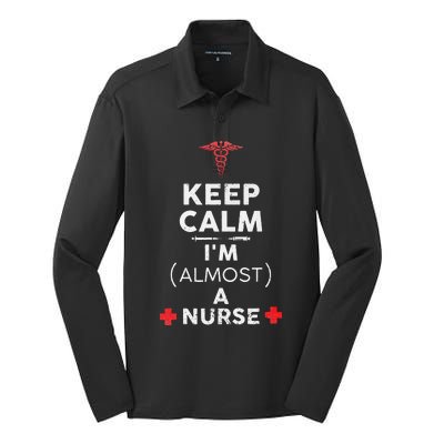 Keep Calm I'm Almost A Nurse Funny Nurse Day Gift Silk Touch Performance Long Sleeve Polo