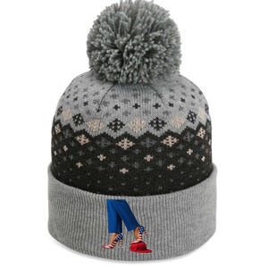 Kamala Harris With High Heels Stepping On Red Hat Gift The Baniff Cuffed Pom Beanie