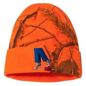 Kamala Harris With High Heels Stepping On Red Hat Gift Kati Licensed 12" Camo Beanie