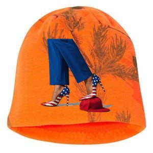 Kamala Harris With High Heels Stepping On Red Hat Gift Kati - Camo Knit Beanie