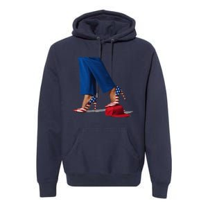 Kamala Harris With High Heels Stepping On Red Hat Gift Premium Hoodie