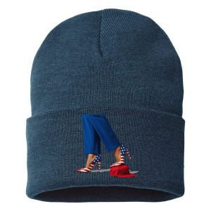 Kamala Harris With High Heels Stepping On Red Hat Gift Sustainable Knit Beanie