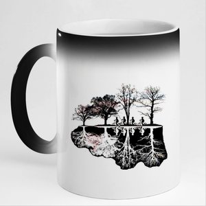 Kids Riding Bikes Through Trees Upside Down 11oz Black Color Changing Mug