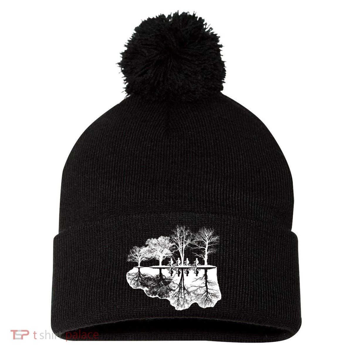 Kids Riding Bikes Through Trees Upside Down Pom Pom 12in Knit Beanie
