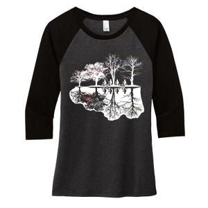 Kids Riding Bikes Through Trees Upside Down Women's Tri-Blend 3/4-Sleeve Raglan Shirt