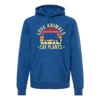 Love Animals Eat Plants Funny Gift Funny Vegan And Vegetarian Gift Premium Hoodie