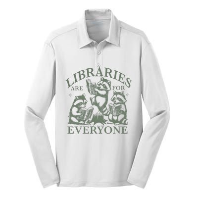 Libraries Are For Everyone Racoon Read Banned Book Librarian Silk Touch Performance Long Sleeve Polo