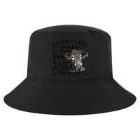 Living Between Jesus Take The Wheel And I Wish A Heifer Cool Comfort Performance Bucket Hat