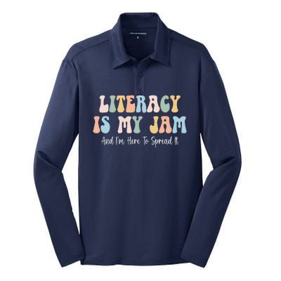 Literacy Is My Jam Reading Interventionist Literacy Teacher Silk Touch Performance Long Sleeve Polo