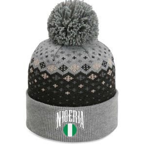 Love Nigeria With Nigerian Flag Inside A Circle The Baniff Cuffed Pom Beanie