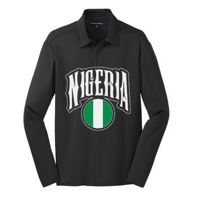 Love Nigeria With Nigerian Flag Inside A Circle Silk Touch Performance Long Sleeve Polo