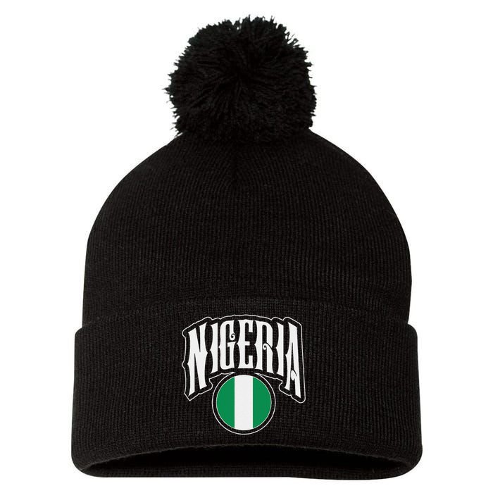 Love Nigeria With Nigerian Flag Inside A Circle Pom Pom 12in Knit Beanie