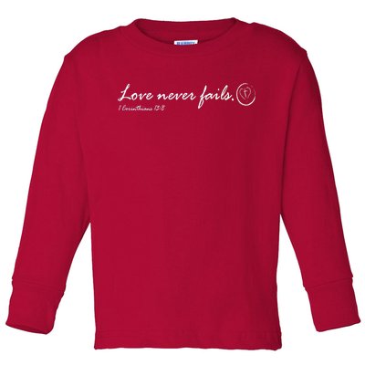 Love Never Fails Toddler Long Sleeve Shirt