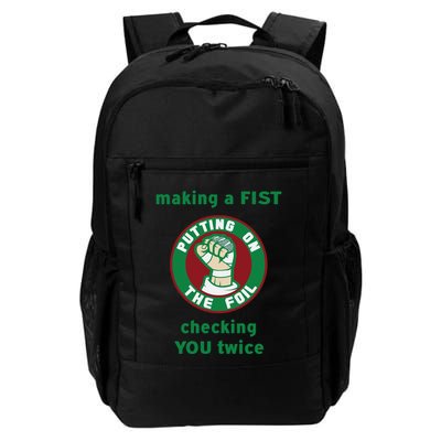 Making A Fist Putting On The Foil Checking You Twice Backpack