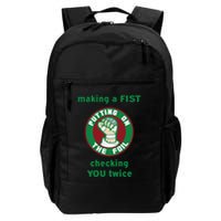 Making A Fist Putting On The Foil Checking You Twice Backpack