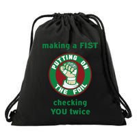 Making A Fist Putting On The Foil Checking You Twice Drawstring Bag