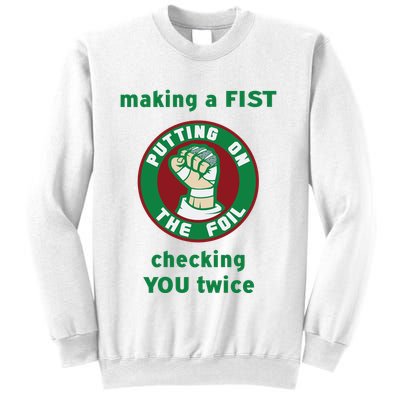 Making A Fist Putting On The Foil Checking You Twice Sweatshirt