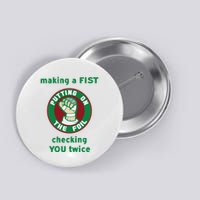 Making A Fist Putting On The Foil Checking You Twice Button