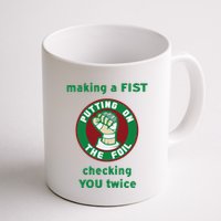 Making A Fist Putting On The Foil Checking You Twice Mug