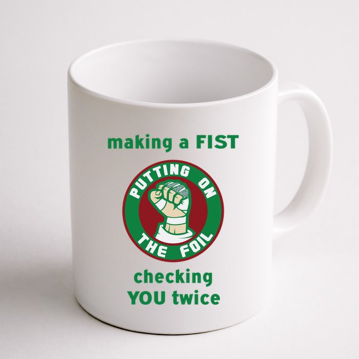Making A Fist Putting On The Foil Checking You Twice Mug