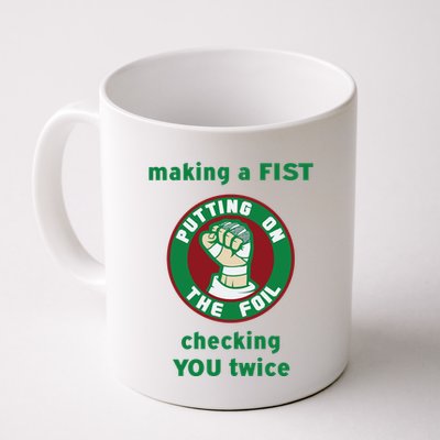 Making A Fist Putting On The Foil Checking You Twice Mug
