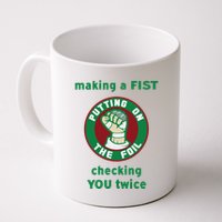 Making A Fist Putting On The Foil Checking You Twice Mug