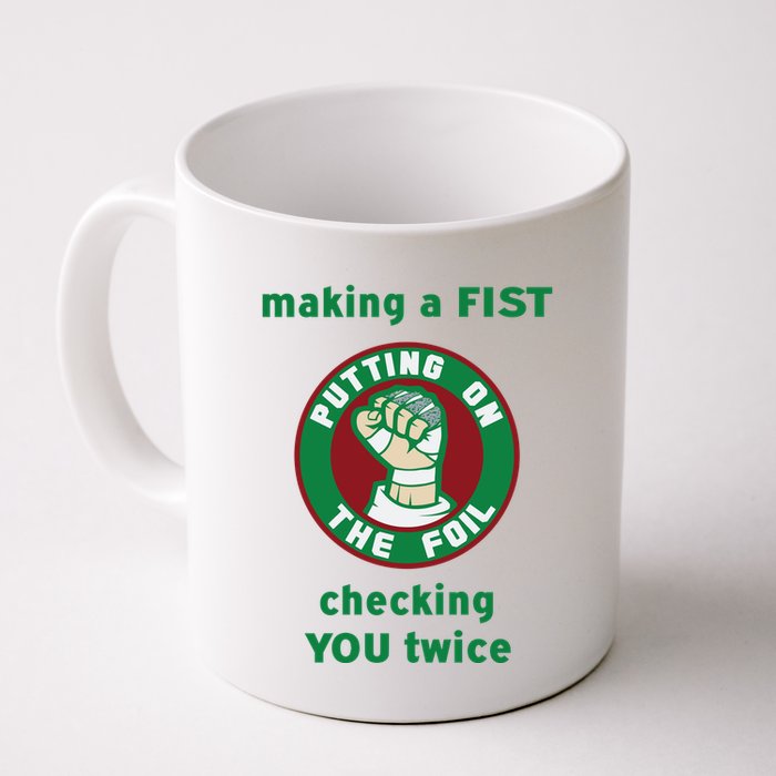 Making A Fist Putting On The Foil Checking You Twice Mug