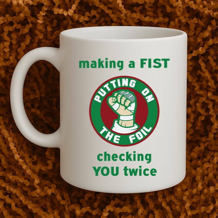 Making A Fist Putting On The Foil Checking You Twice Mug