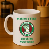 Making A Fist Putting On The Foil Checking You Twice Mug