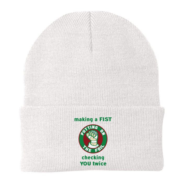 Making A Fist Putting On The Foil Checking You Twice Beanie