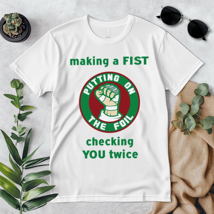 Making A Fist Putting On The Foil Checking You Twice Premium T-Shirt
