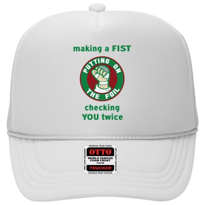 Making A Fist Putting On The Foil Checking You Twice Trucker Hat