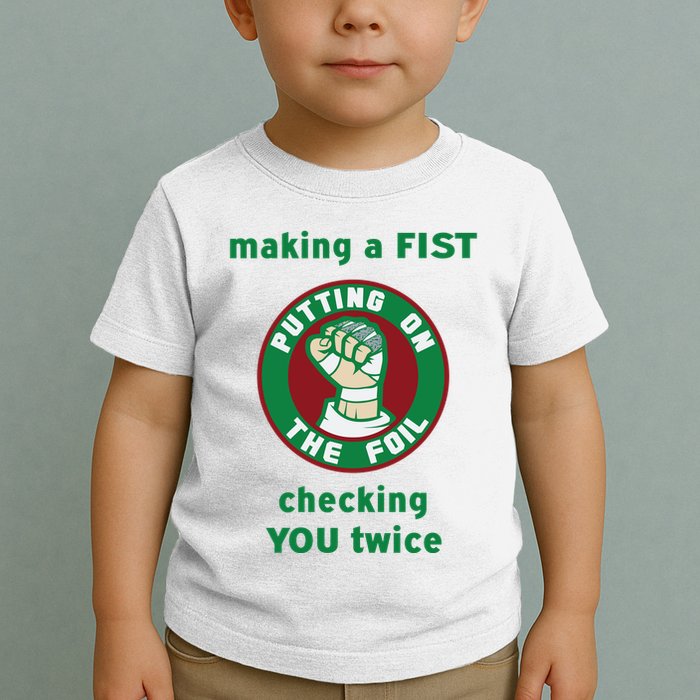 Making A Fist Putting On The Foil Checking You Twice Toddler T-Shirt