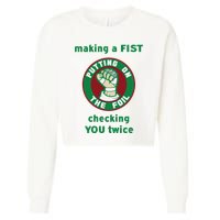 Making A Fist Putting On The Foil Checking You Twice Cropped Pullover Crew